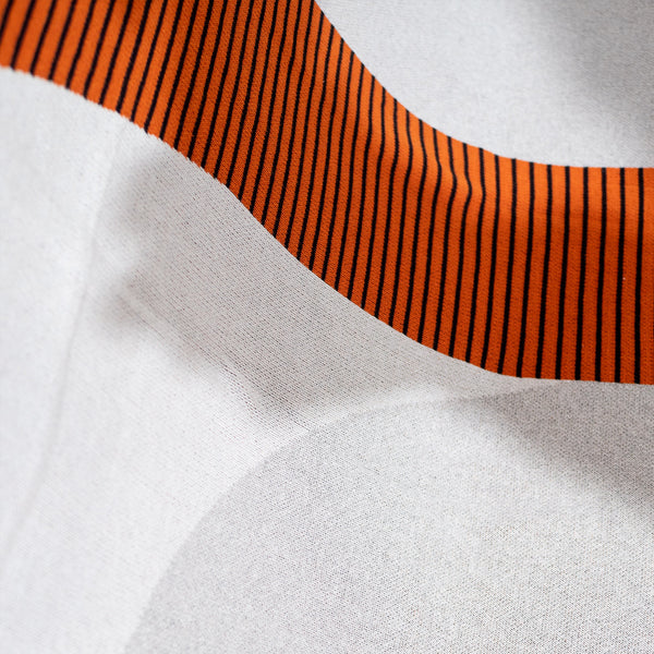 Pläd / Filt - Stickad Abstrakt Färgblock Orange Fabric Close-up Image